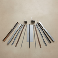 A36 Steel Bundle Pack on light grey concrete background